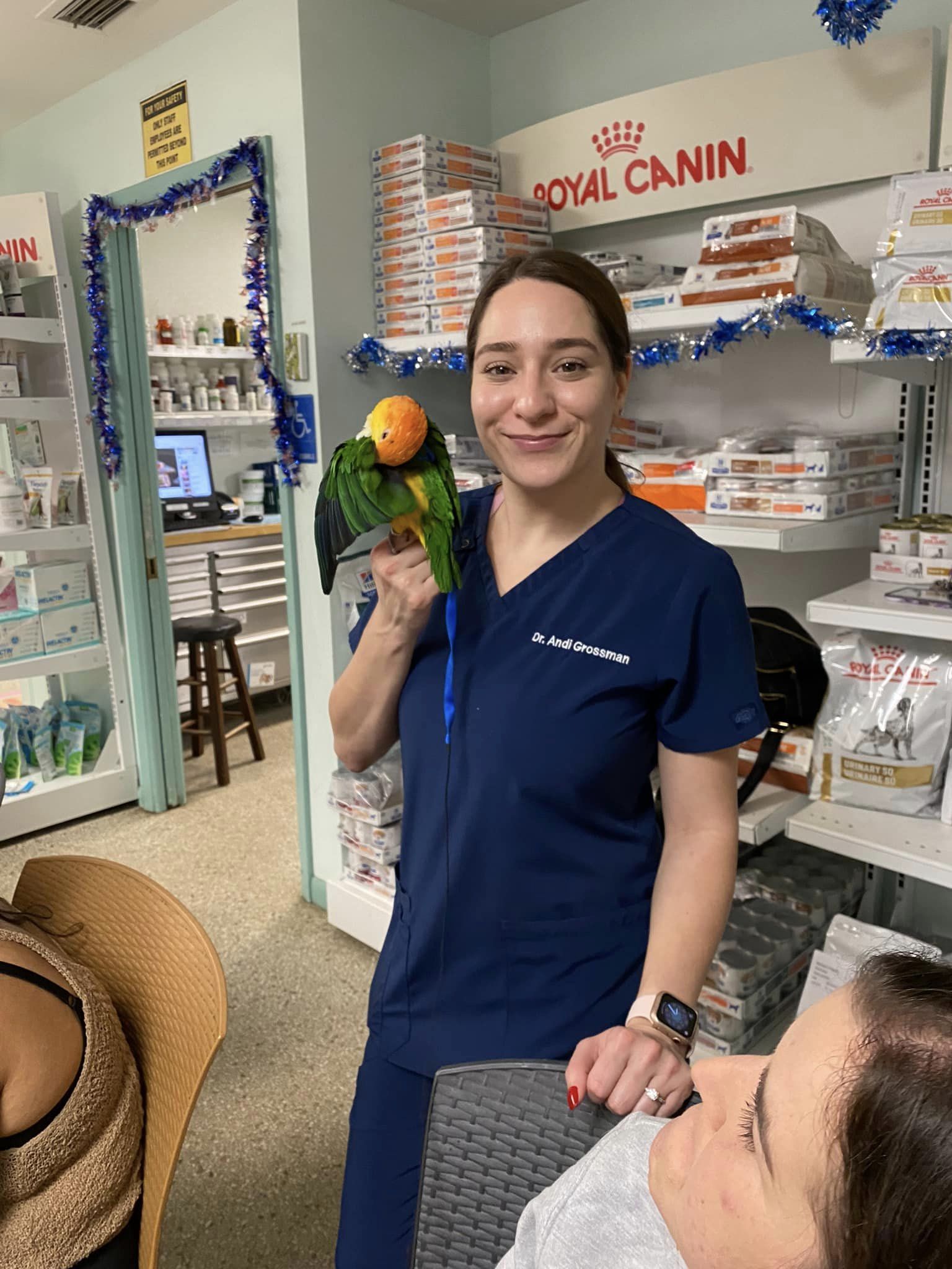 Dr. Grossman with a pet bird
